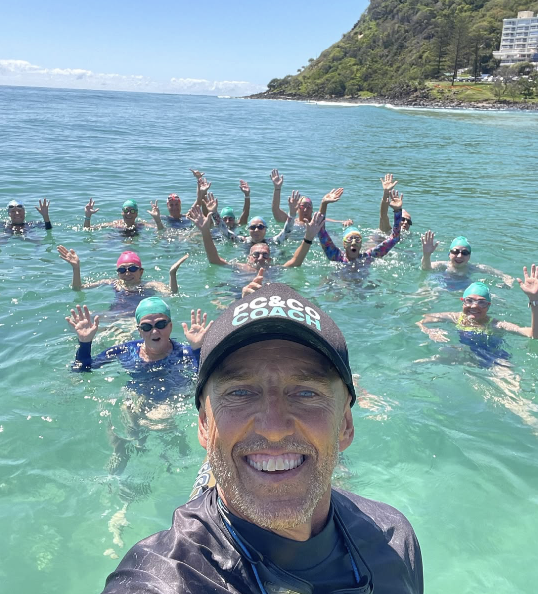 Phil Clayton coaching a squad at Burleigh Beach ,Australia